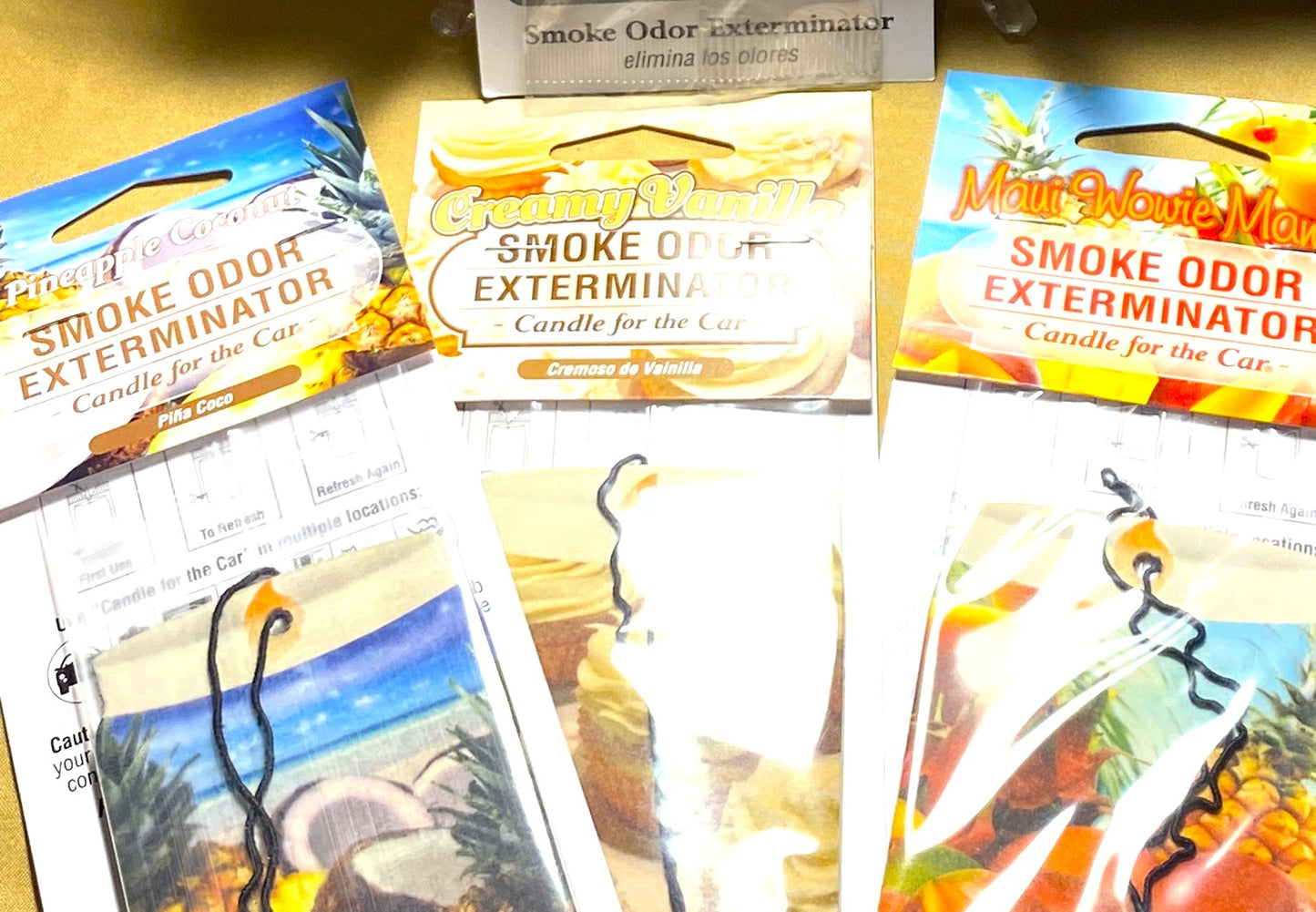 Car Fragrance Hanging "Smoke Odor Eliminator". A candle for your car.