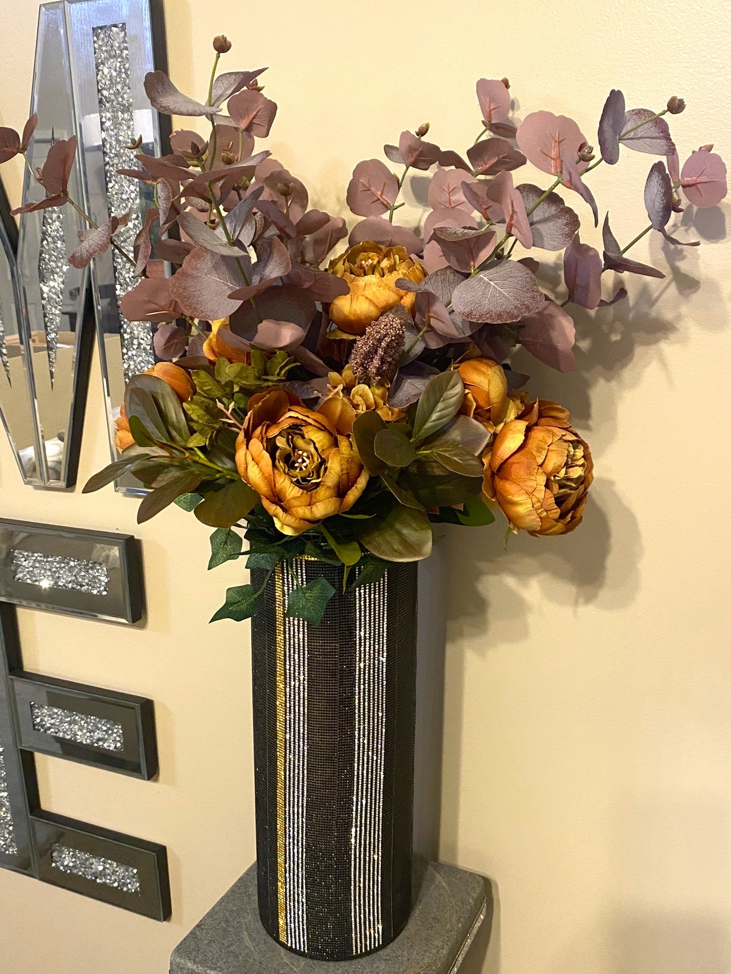 Crystal Rhinestone Cylinder Vase (glass) is 15" tall, Black, Silver & Gold V-Style. Long-stem silk floral arrangement sold separately.