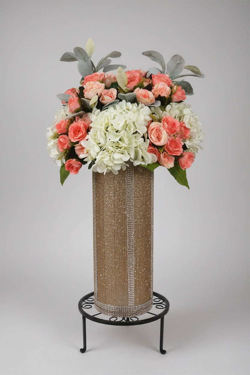 Rose Hydrangea floral arrangement in a champagne crystal rhinestone vase with greenery designed by bling-it-werks.com