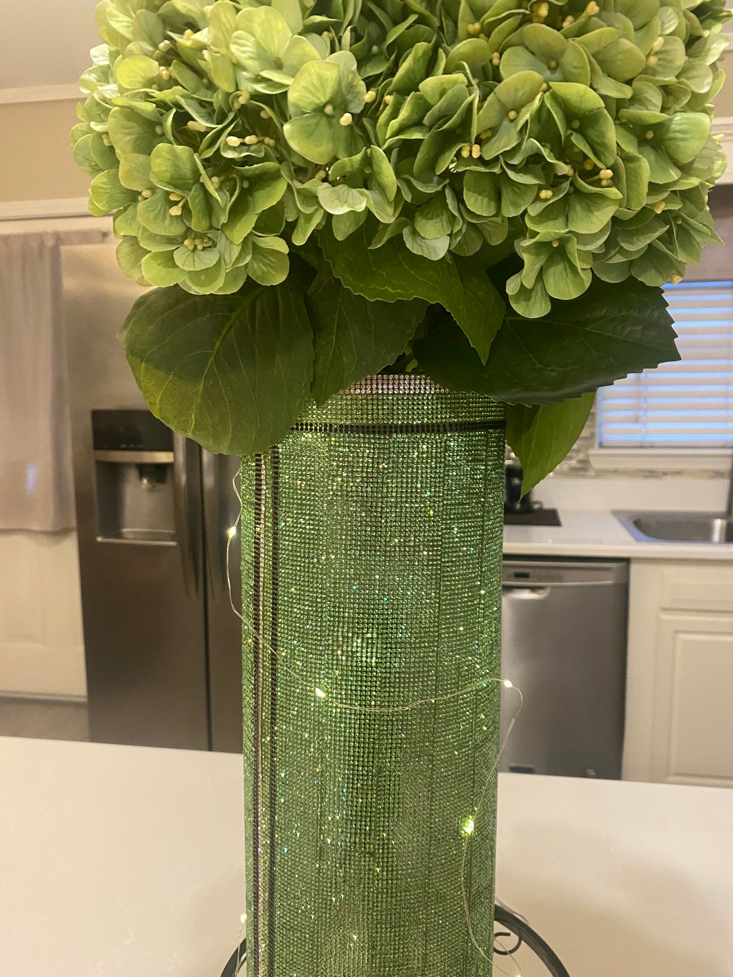 Crystal Rhinestone Vase Green (heavy, cylinder, glass) is 15" tall. Long-stem silk floral arrangements sold separately.