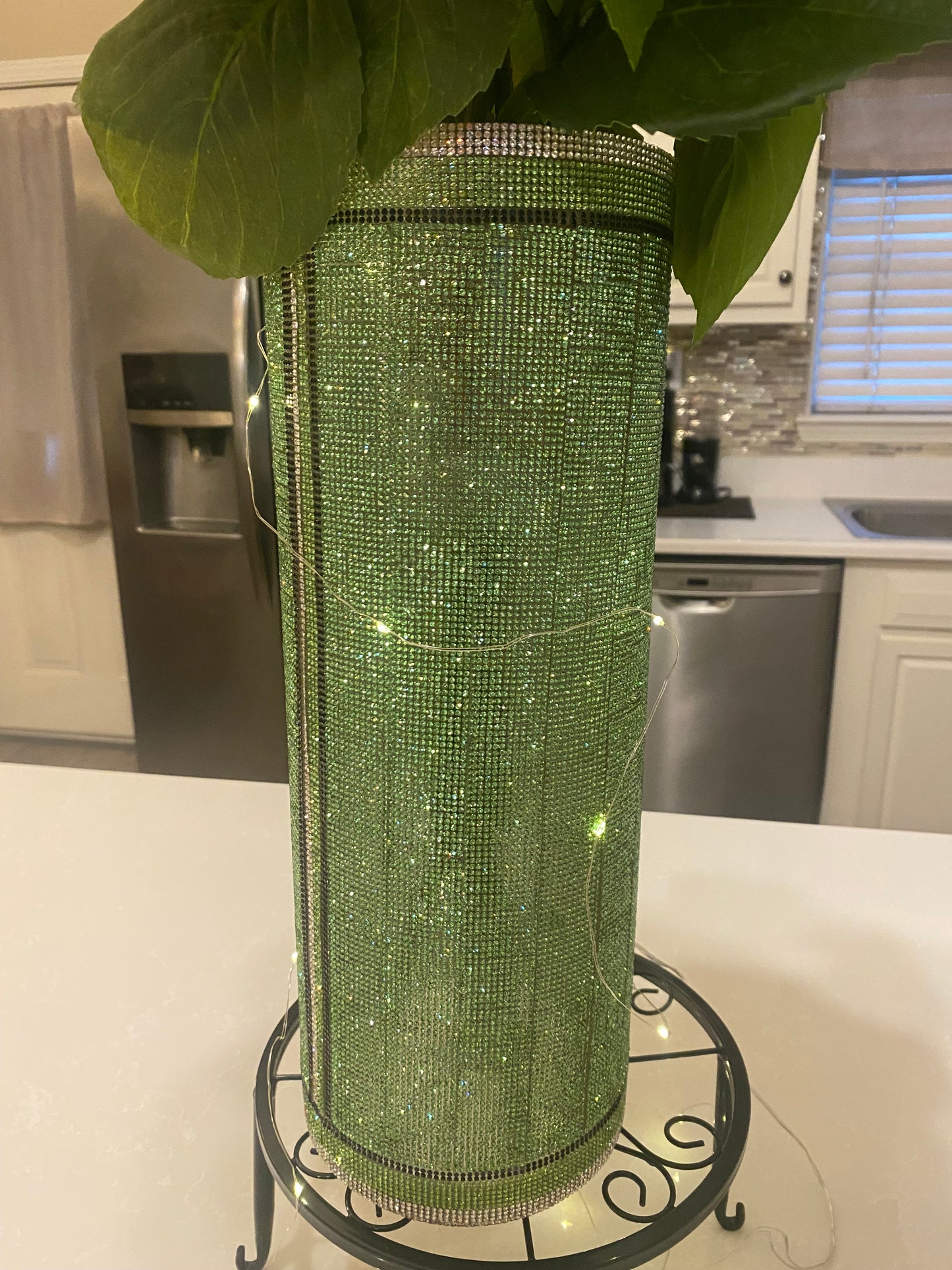 Green crystal rhinestone vase with a textured surface and string lights designed by bling-it-werks.com