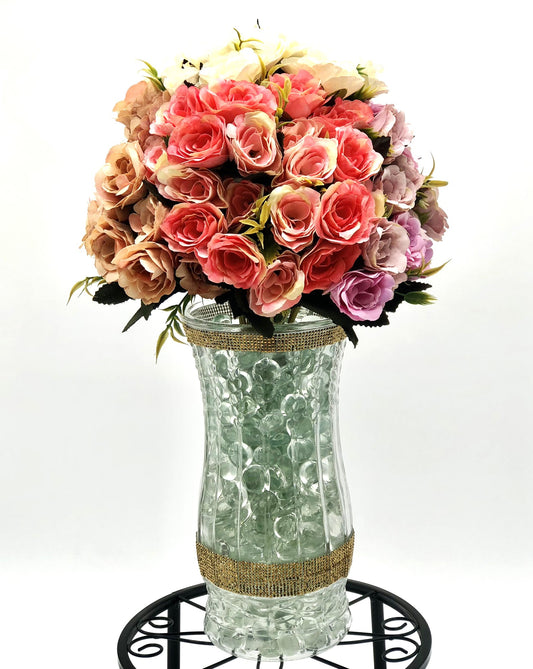 Rose Color Medley in Sculpted-Glass Vase with Crystal Rhinestone trim. Lucious bouquet of small roses with greenery a beautiful silk floral arrangement.