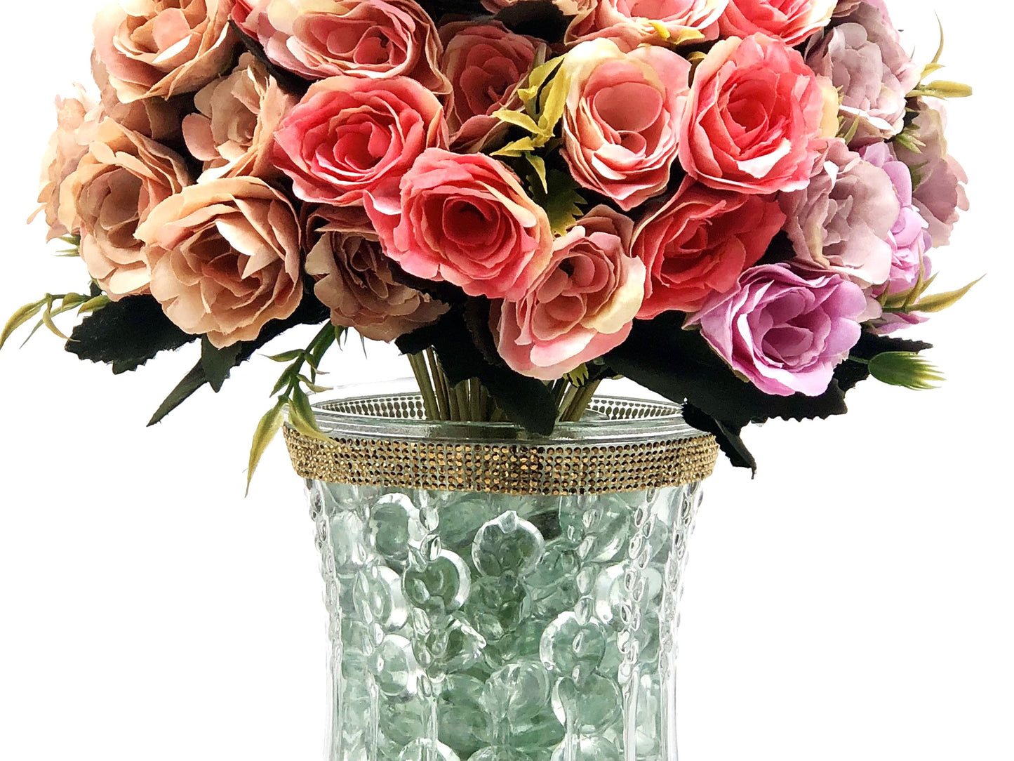Rose Color Medley in Sculpted-Glass Vase with Crystal Rhinestone trim. Lucious bouquet of small roses with greenery a beautiful silk floral arrangement.