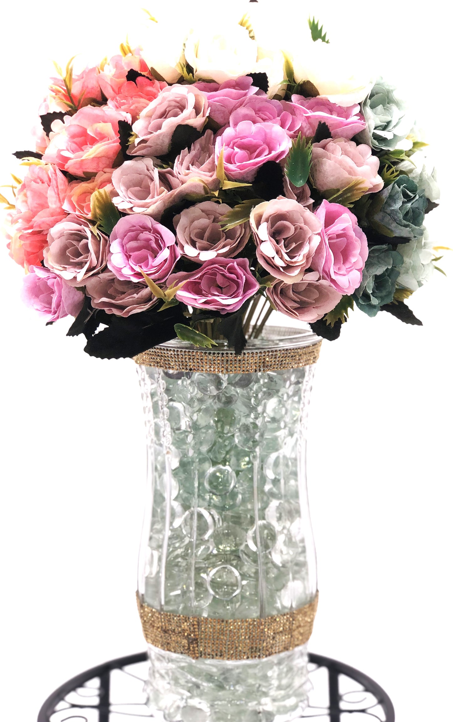 Rose Color Medley in Sculpted-Glass Vase with Crystal Rhinestone trim. Lucious bouquet of small roses with greenery a beautiful silk floral arrangement.
