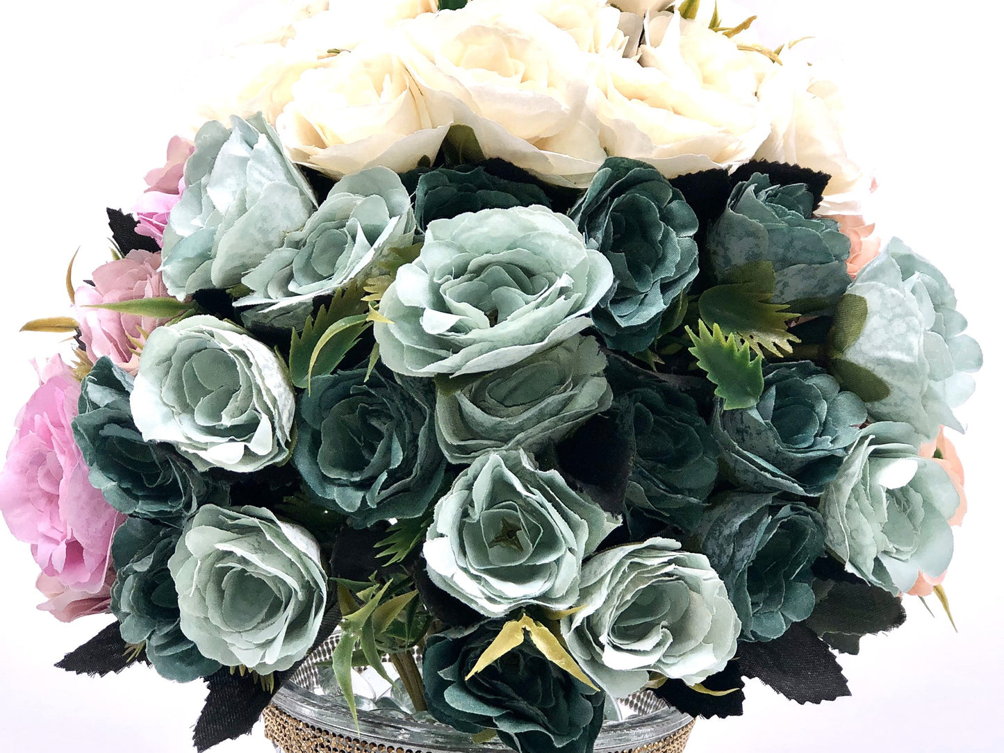 Rose Color Medley in Sculpted-Glass Vase with Crystal Rhinestone trim. Lucious bouquet of small roses with greenery a beautiful silk floral arrangement.