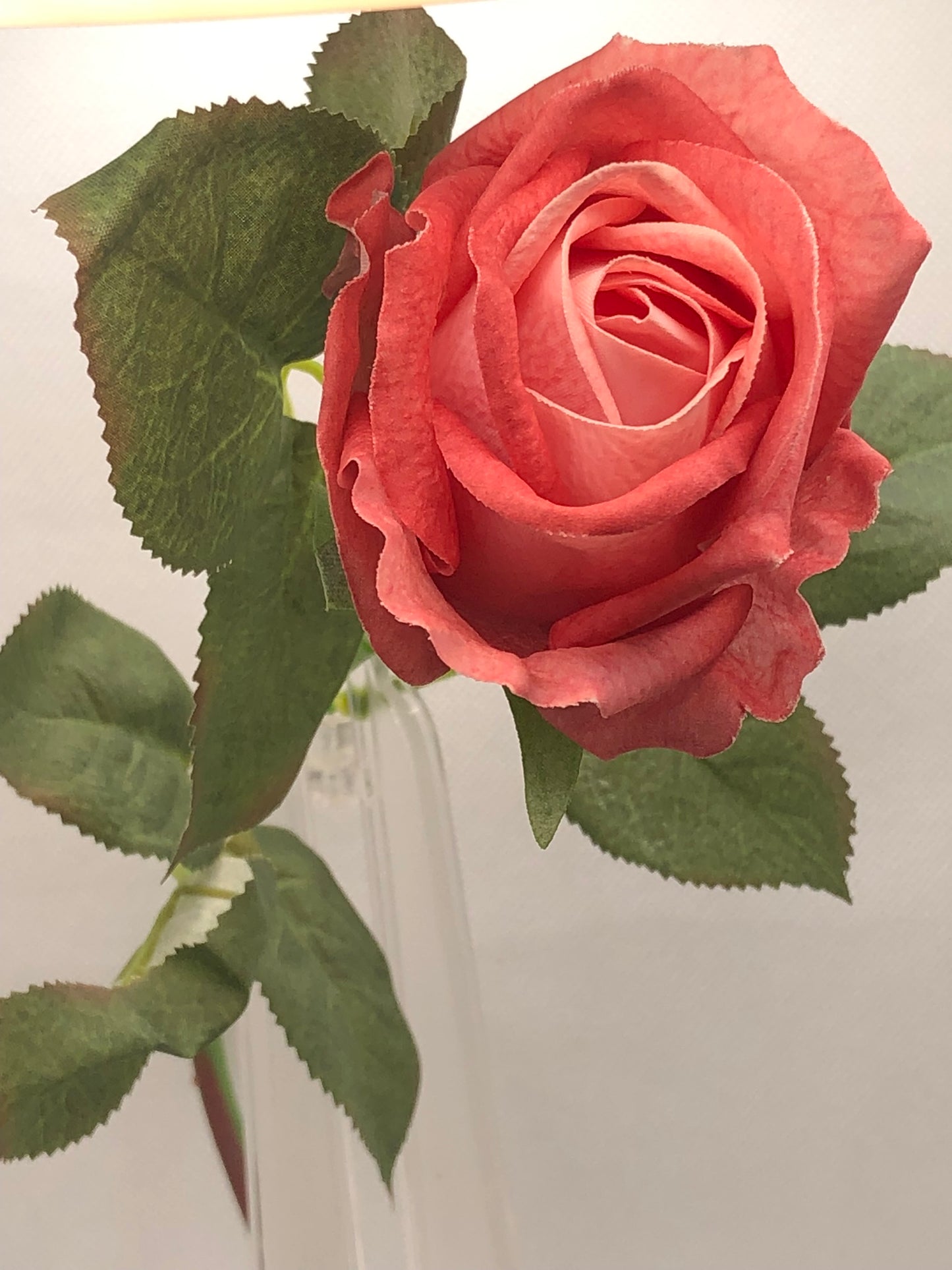 Artificial Rose Long-stem bouquet with silk flowers and green leaves are 24" tall.