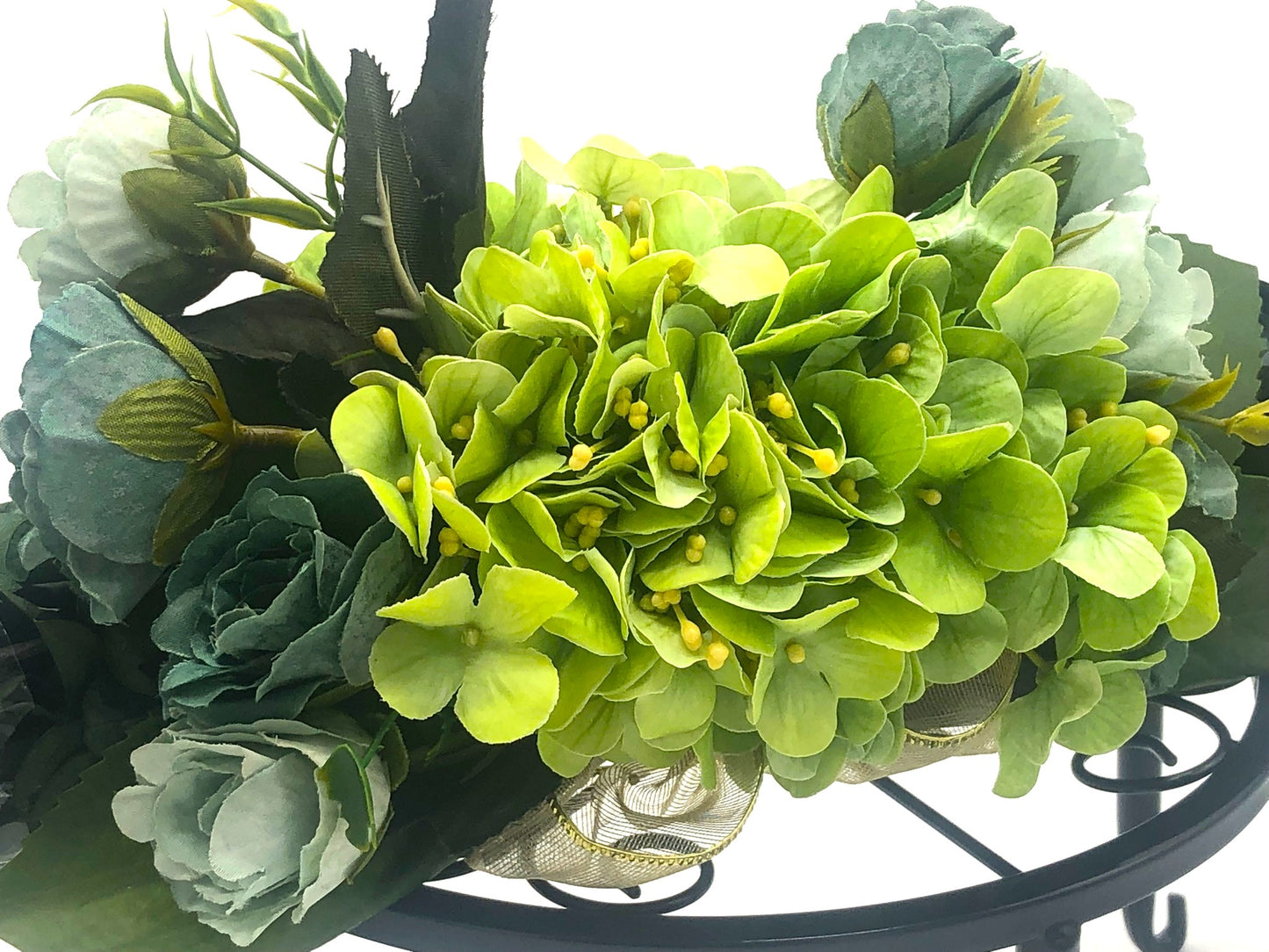 Eucalyptus Swag with Green Hydrangea, small rose bouquet, gold bow and crystal rhinestone trim. Real Eucalyptus. 32" width.