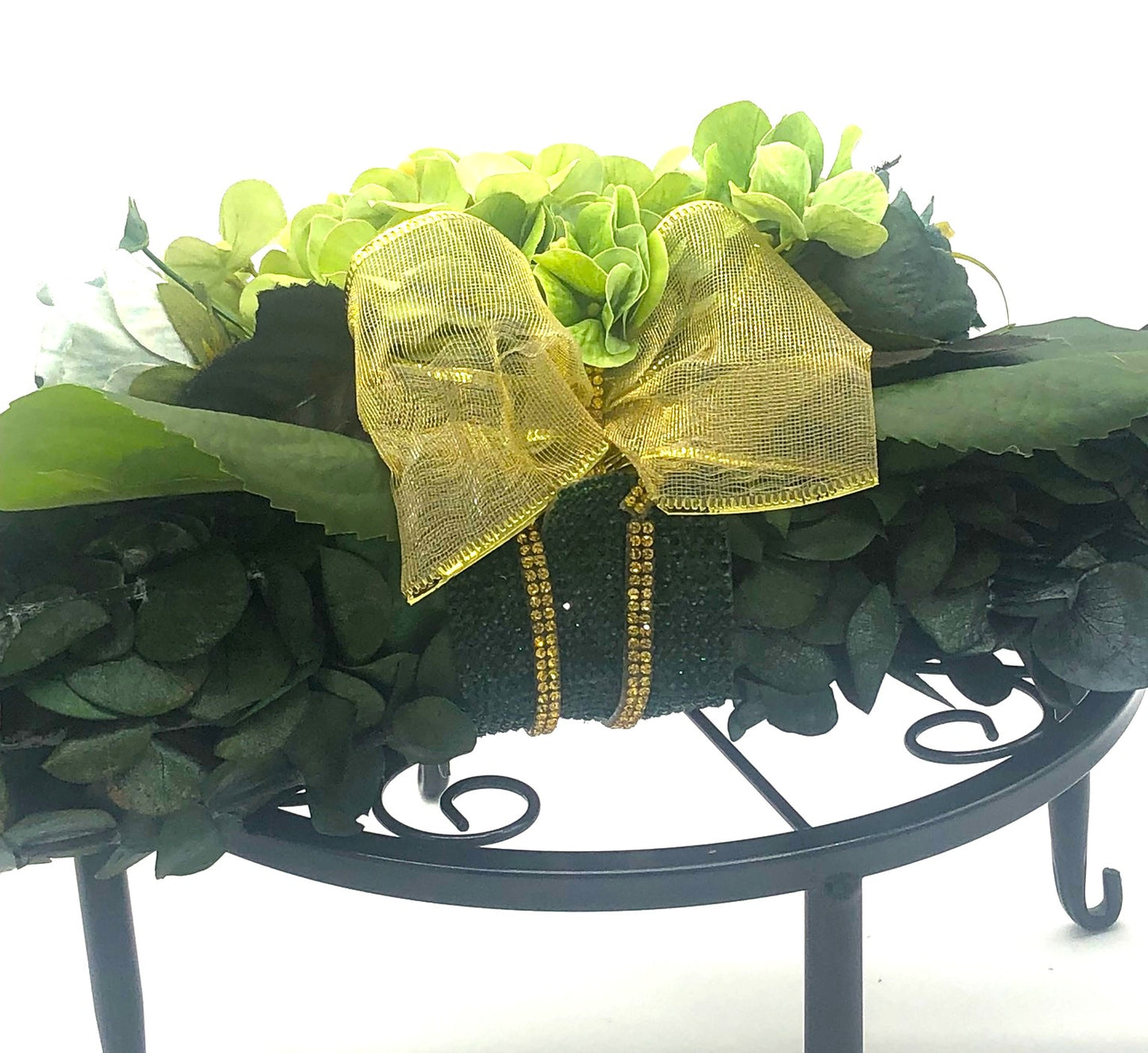Eucalyptus Swag with Green Hydrangea, small rose bouquet, gold bow and crystal rhinestone trim. Real Eucalyptus. 32" width.